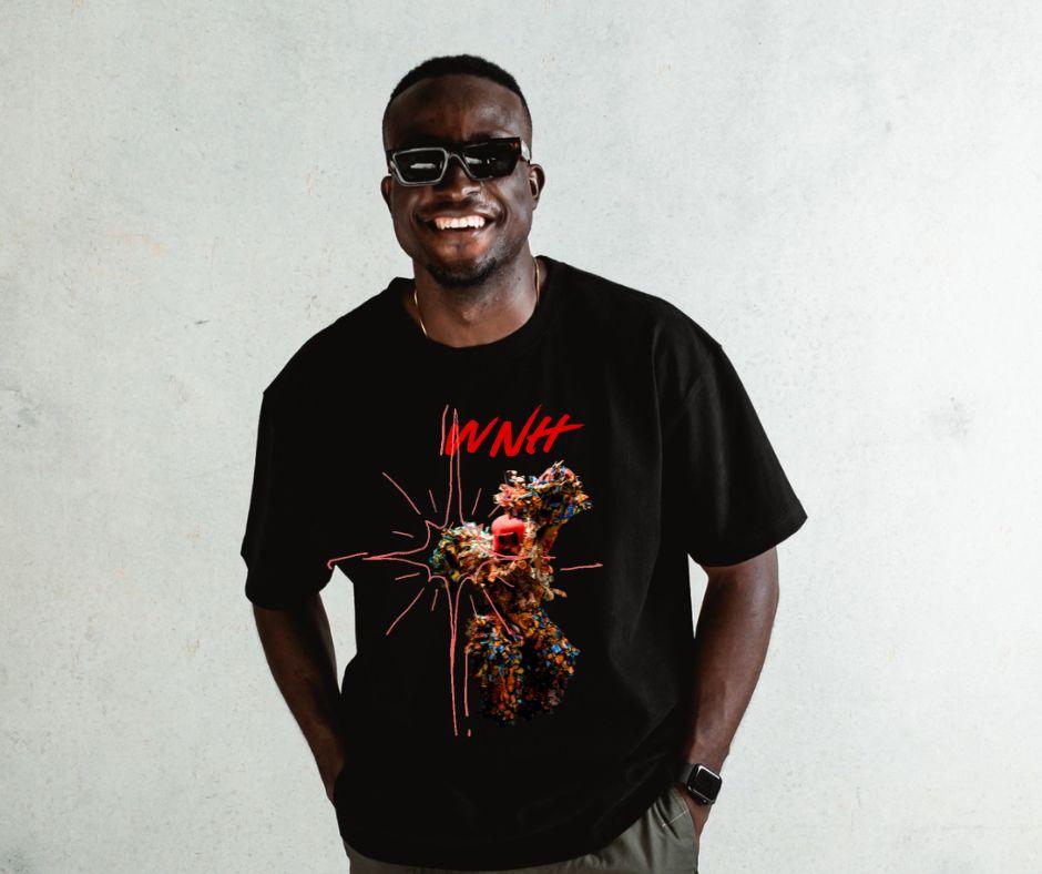 Smiling man wearing a black WNH t-shirt